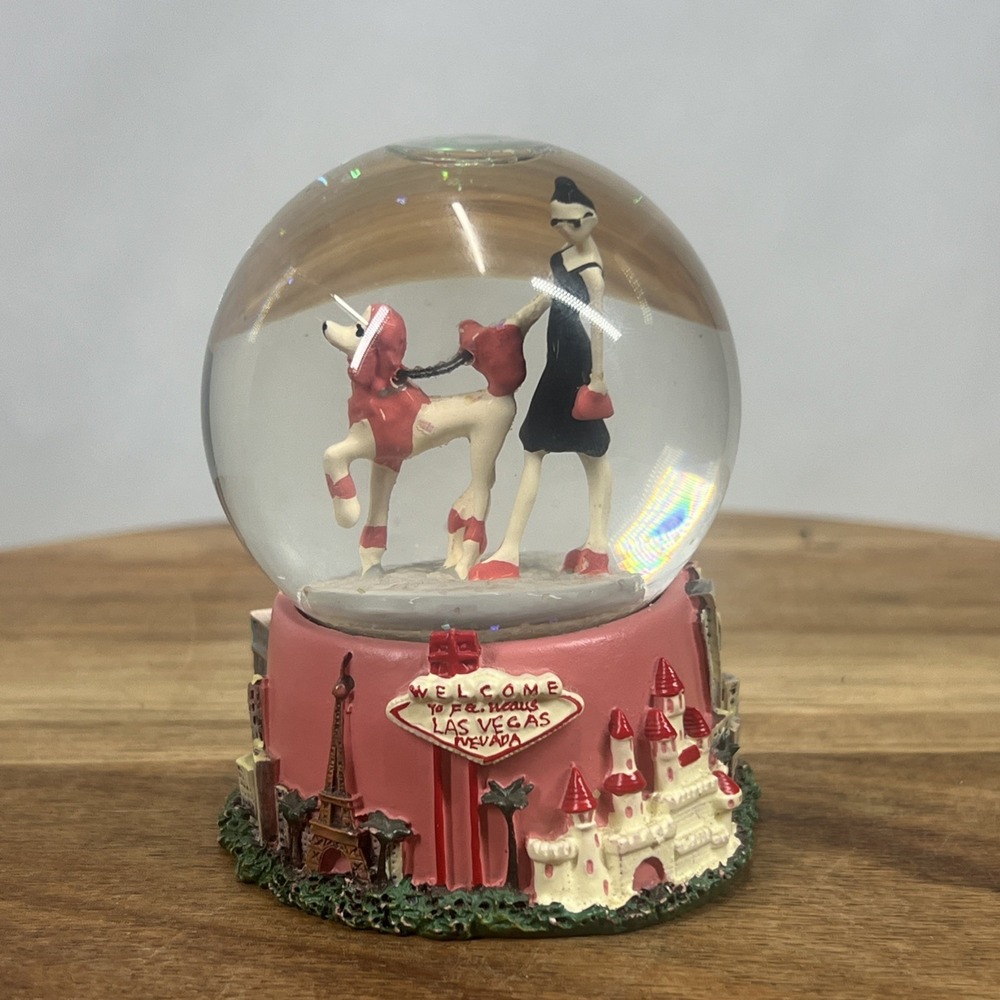 Las Vegas Glitter Snow‎ Globe Landmarks 3.5 Inch.  Woman With Dog Figurine.